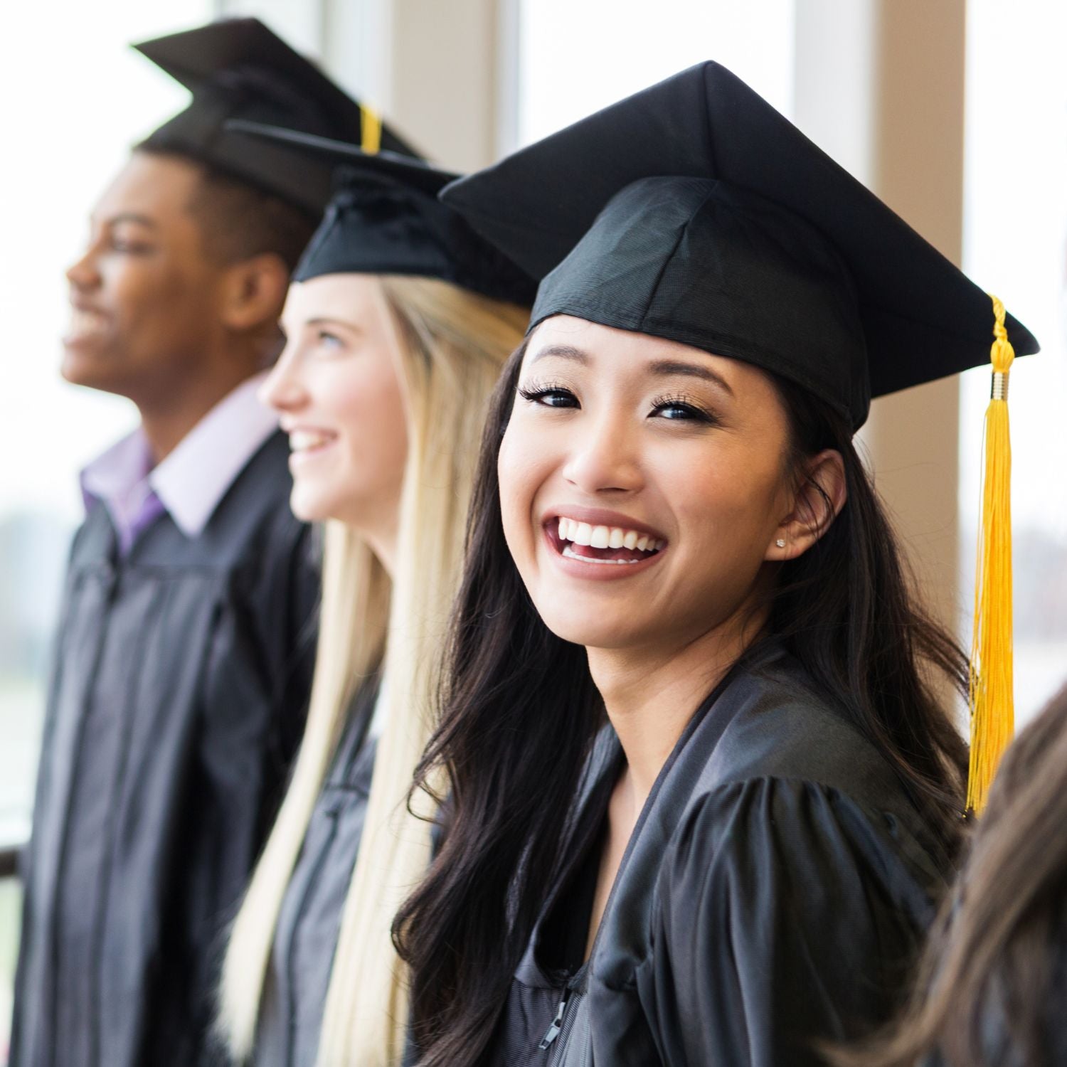University graduates smiling